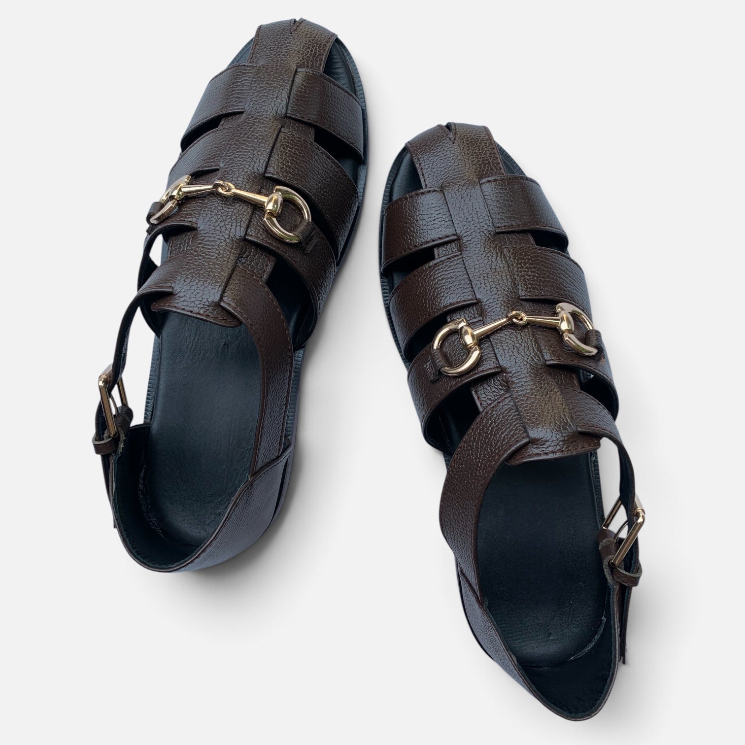 Men's handmade leather fisherman sandals by TAILOR LEATHER featuring brown leather straps and sturdy soles.