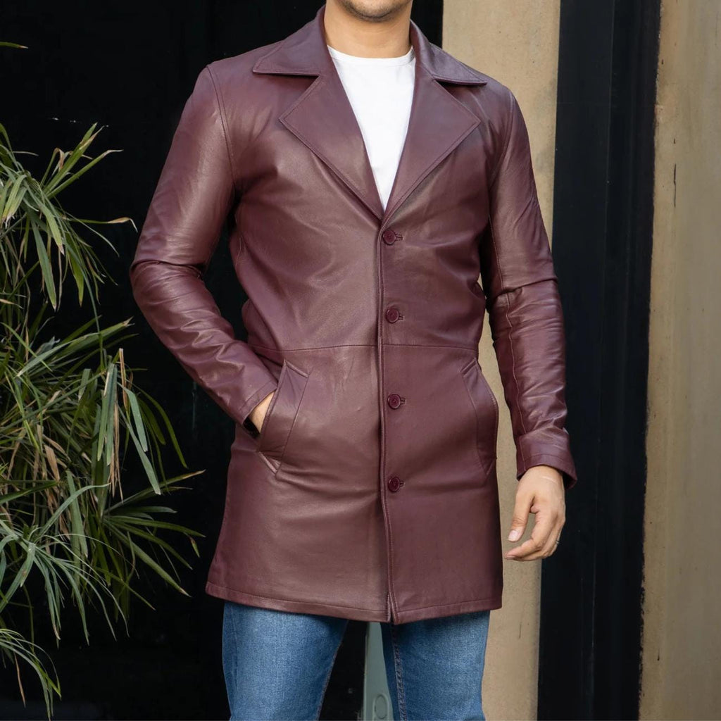 Men's handmade black leather trench coat from TAILOR LEATHER, showing the back view with detailed craftsmanship and classic design.